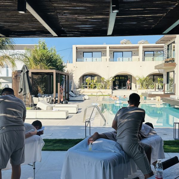 massage therapists in mobile villa spa delivering services to a group of people